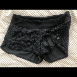 Black Lululemon running shorts, size 8